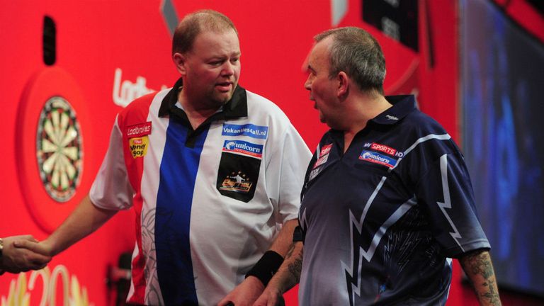 Phil Taylor and Raymond van Barneveld: Old rivals in on-stage spat