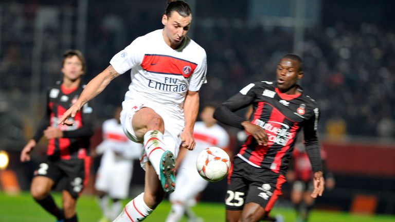 Zlatan Ibrahimovic challenges for the ball
