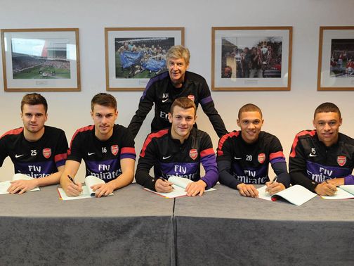 Arsene Wenger is happy as the five players sign new contracts.