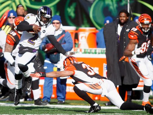 Tyrod Taylor runs upfield for the Ravens