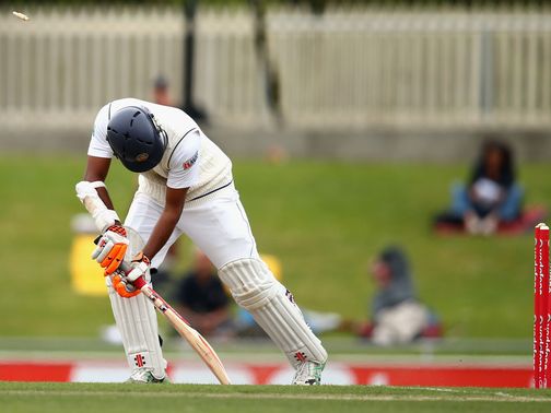 Dimuth Karunaratne is bowled by Starc