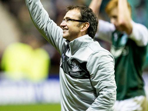 Pat Fenlon celebrates Hibs' victory