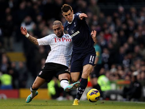 Ashkan Dejagah slides in on Gareth Bale