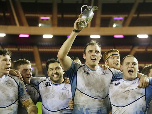 Glasgow skipper Alastair Kellock lifts the 1872 Cup