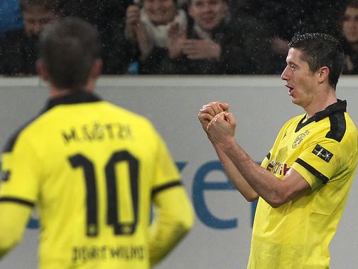 Robert Lewandowski scored as Dortmund won 3-1.