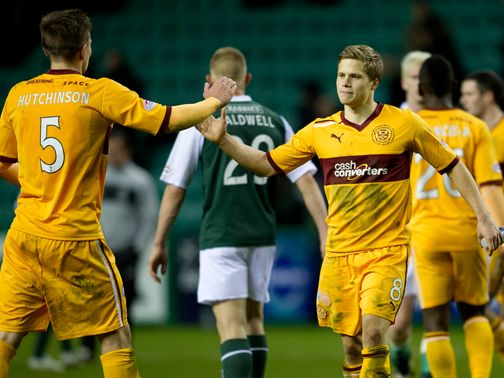 Motherwell celebrate their victory at Hibs