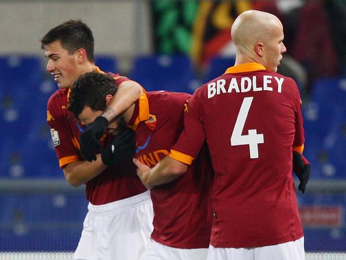 Matteo Destro is mobbed after his goal