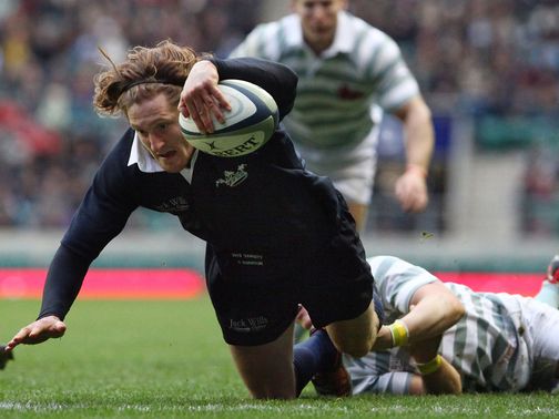 Full-back Sam Egerton dives in for an Oxford try
