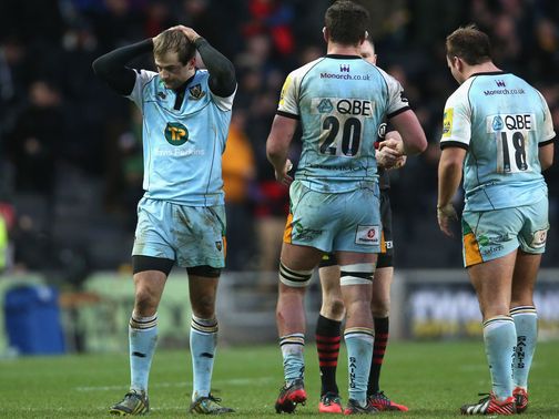 Myler reacts after hitting the bar with the last kick of the match