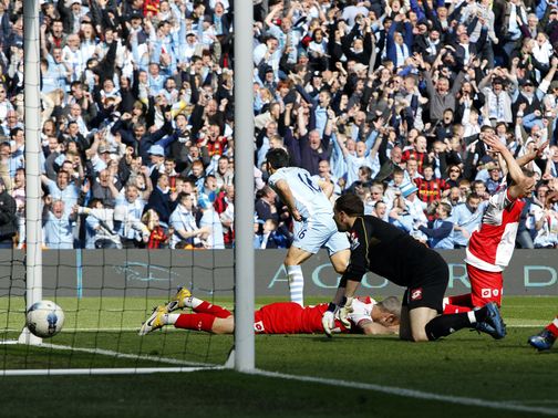 Sergio Aguero wheels away to celebrate a title-winning goal&nbsp;