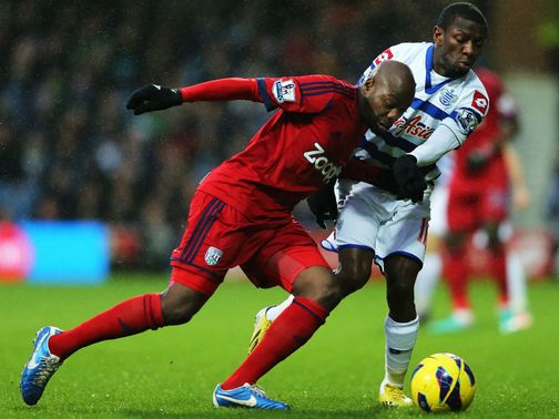 Mulumbu and Wright Phillips battle for possession