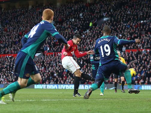 Robin van Persie scores United's opening goal