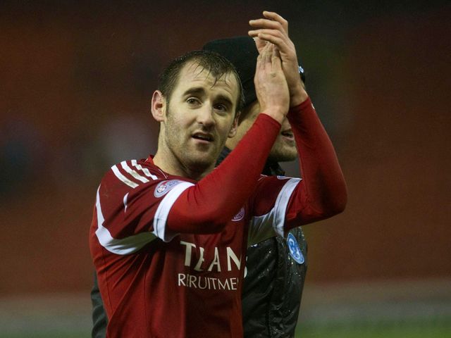 Two-goal Niall McGinn salutes the fans