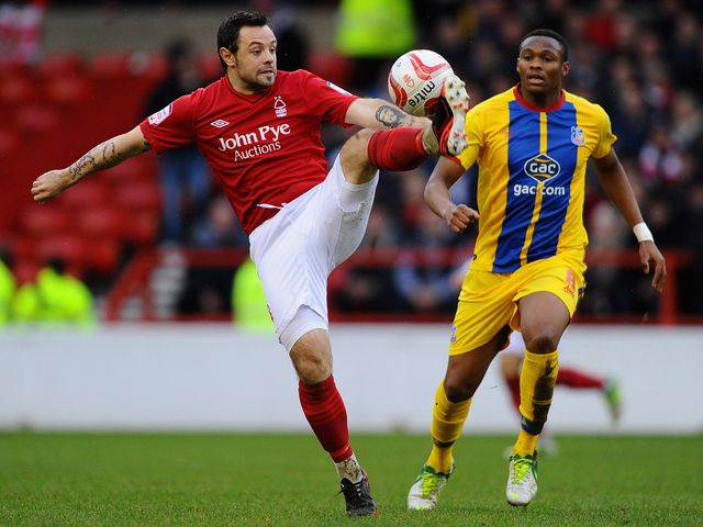 Andy Reid controls a high ball