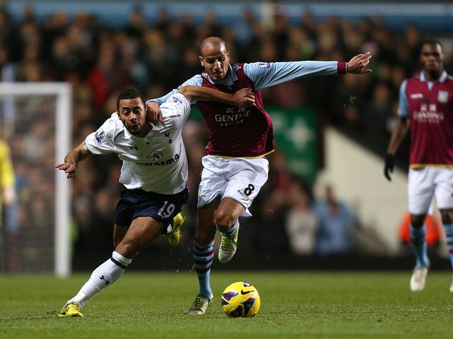 Mousa Dembele and Karim El Ahmadi battle for the ball