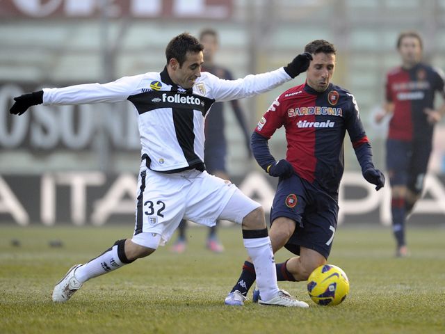 Marco Marchionni challenges Andrea Cossu