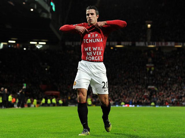 Robin van Persie celebrates his goal