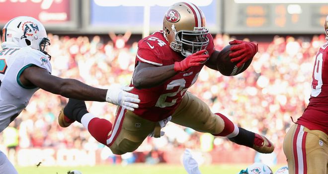 Anthony Dixon dives in for a San Francisco touchdown
