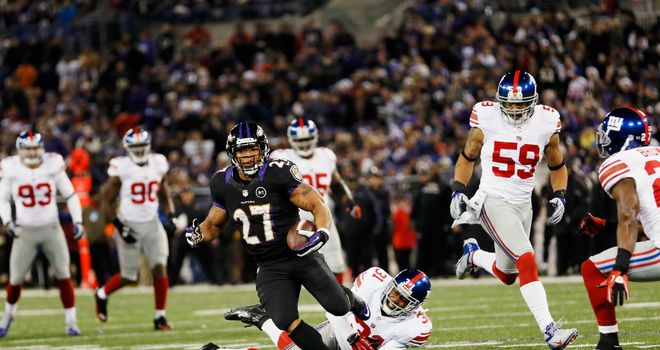Ray Rice evades the New York Giants defence