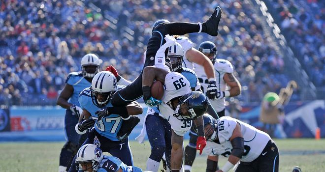 Richard Murphy gets upended by the Titans