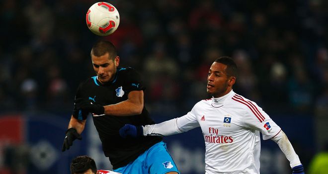 Eren Derdiyok wins a header.