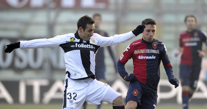 Marco Marchionni challenges Andrea Cossu