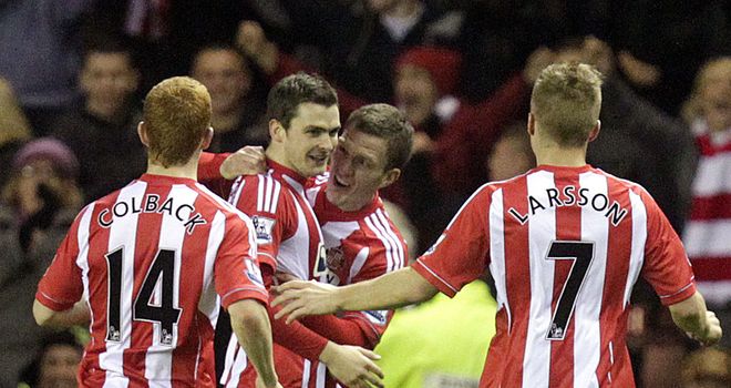 Adam Johnson: Celebrates winner against former club