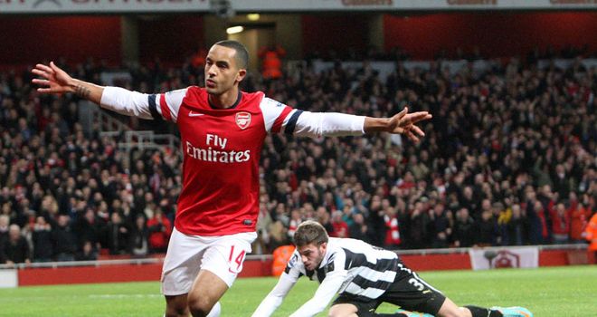 Theo Walcott staked his claim for a striking role with a Christmas hat-trick