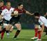 Brad Barritt of Saracens steps inside Conor Murray of Munster
