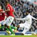 Tottenham striker Emmanuel Adebayor tries his luck from distance against Swansea City