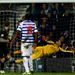 Goalkeeper Julio Cesar of QPR dives in vain as Liverpool's Daniel Agger scores his side's third goal.