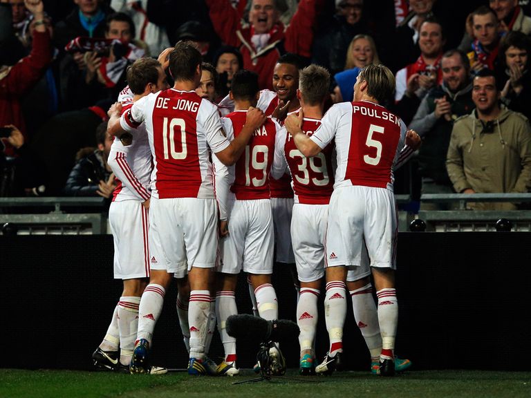 Ajax celebrate on the way to beating PSV