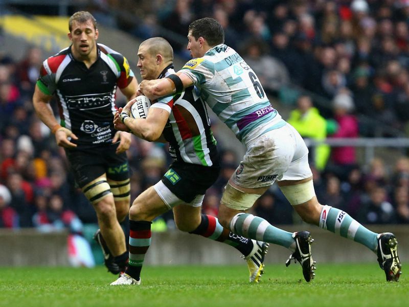 Fully committed: Declan Danaher tackles Mike Brown as Chris Robshaw watches on