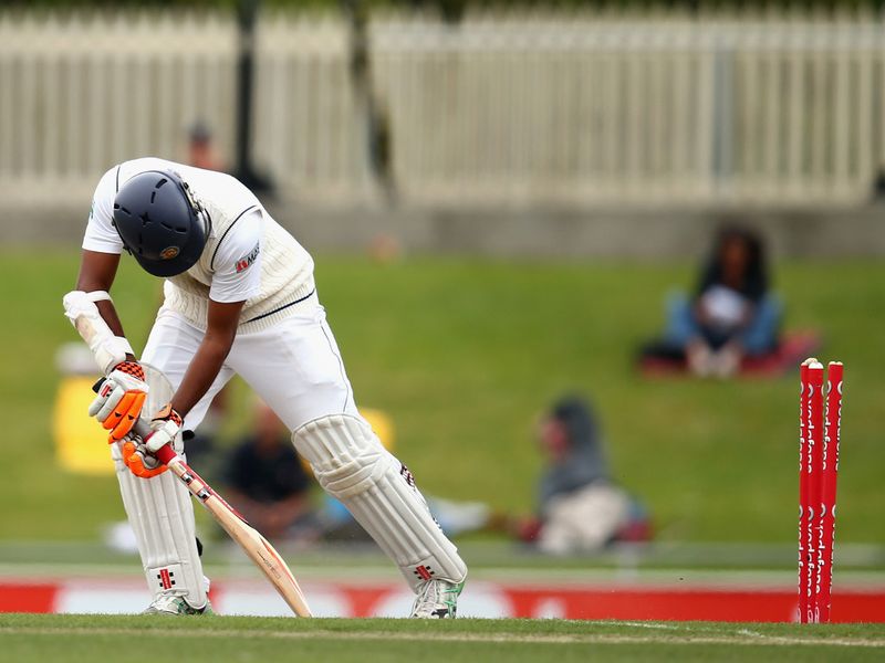 Dimuth Karunaratne was bowled by Mitchell Starc for 30. Sri Lanka were 65 for two at stumps.