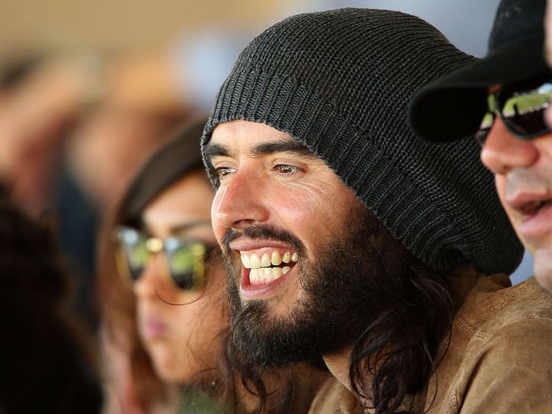 British actor and comedian Russell Brand enjoyed the action from the stands.