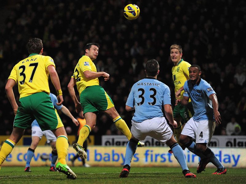 Norwich are offered some hope when Snodgrass' cross is headed back across goal by Bassong and Russell Martin is on-hand to head home.