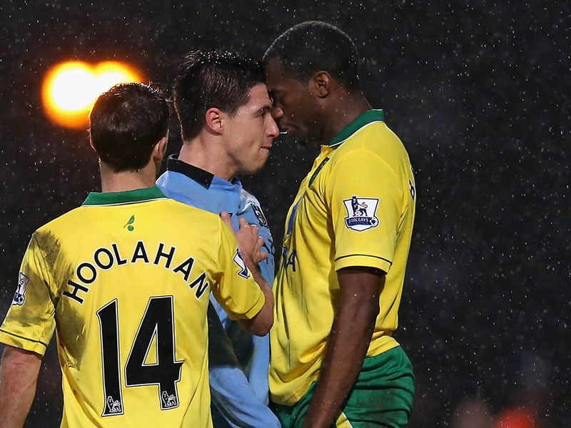 Just before the break, Man City are reduced to ten-men when Samir Nasri is adjudged to have headbutted Sebastien Bassong.