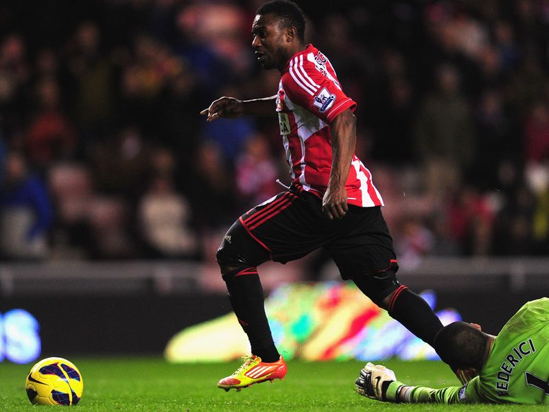Stephane Sessegnon rounds the keeper to slot home Sunderland's third goal in stoppage time