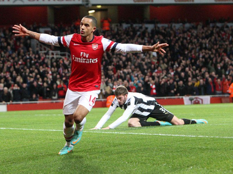 Walcott celebrates his sixth Premier League goal this season.