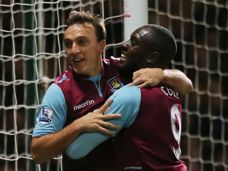 Mark Noble celebrates after levelling from the penalty spot