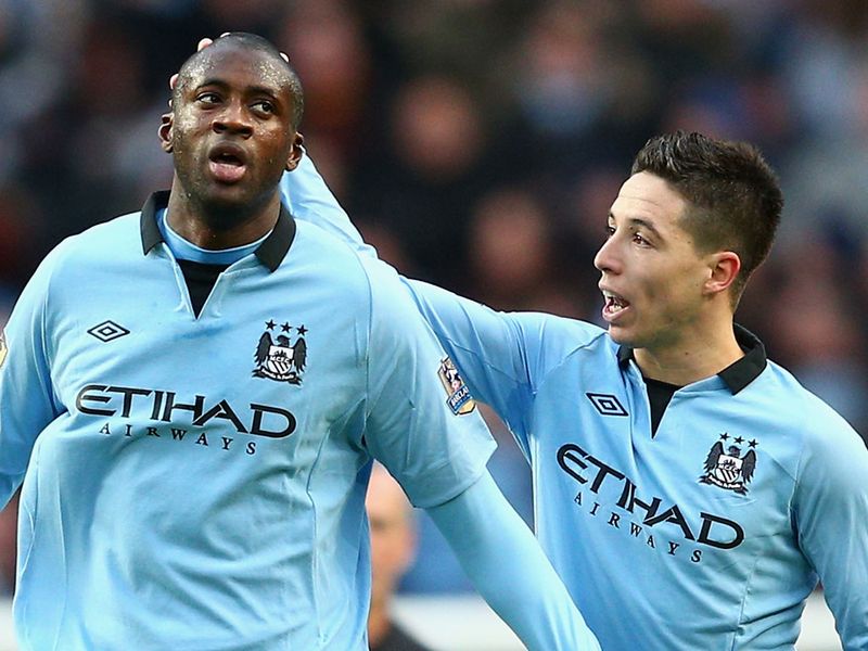 Yaya Toure is congratulated by Samir Nasri after pegging one back