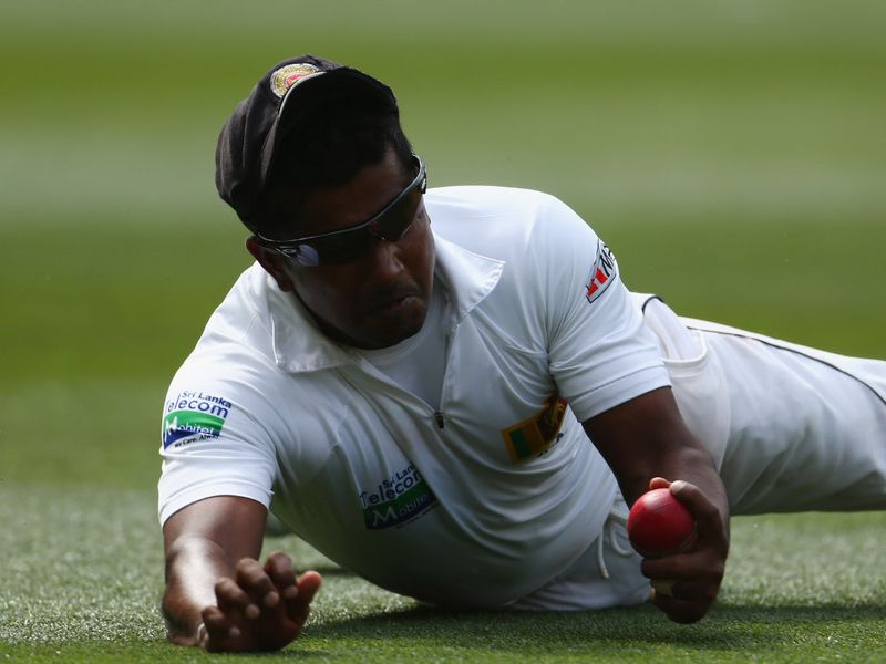 Rangana Herath took a great catch to get rid of Michael Hussey.