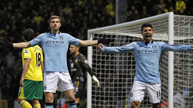 Dzeko (l): scored two in five minutes against Norwich