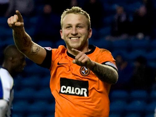 Johnny Russell scored a hat-trick for Dundee United