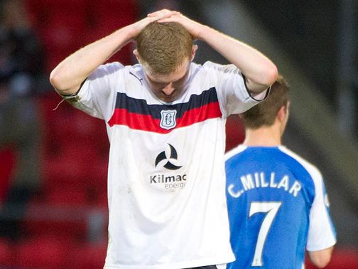 Dejection for Dundee's Brian Easton at full-time