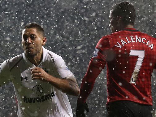 Clint Dempsey celebrates his late leveller for Spurs