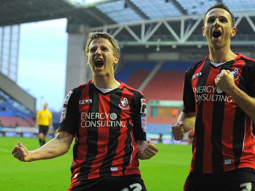 Eunan O'Kane and Marc Pugh celebrate for Bournemouth