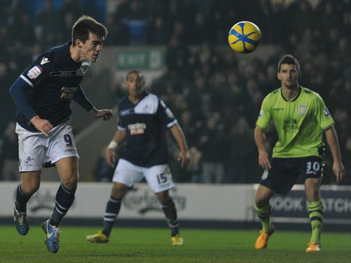 John Marquis heads home Millwall's late winner