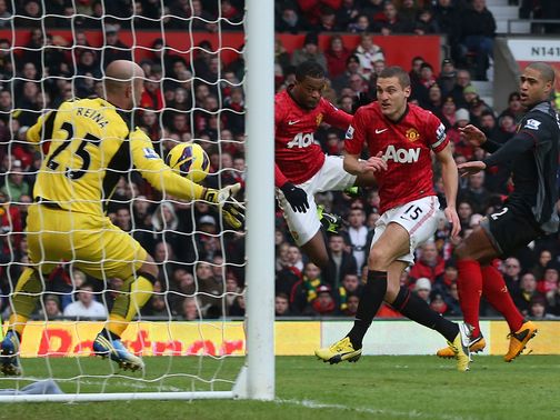 Patrice Evra's header goes in off Nemanja Vidic to double United's lead&nbsp;