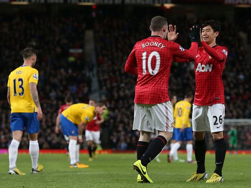 Manchester United lead the Premier League by seven points after beating Southampton.